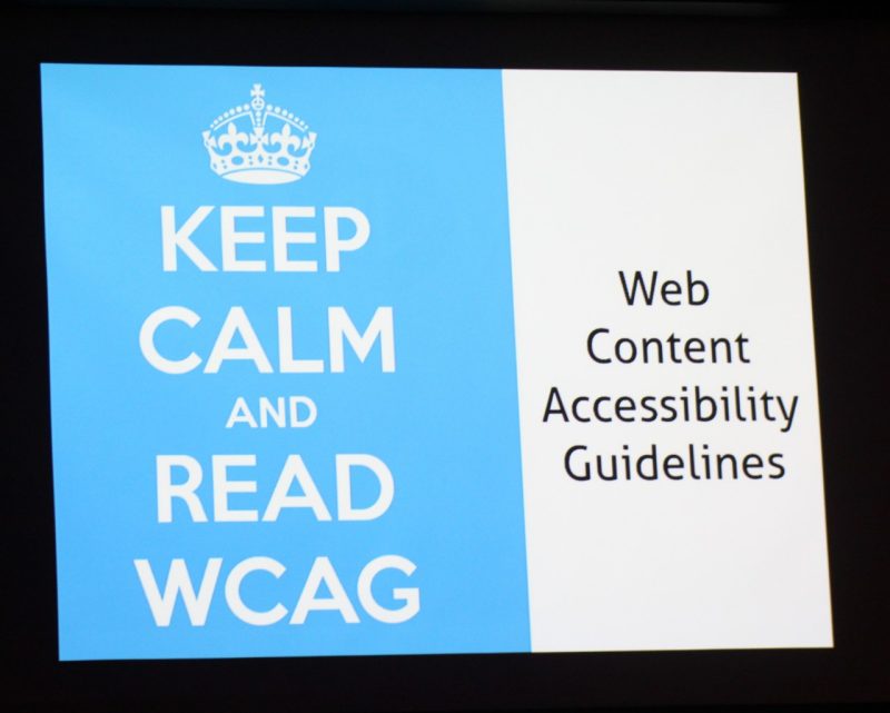 Displayed on screen is a crown logo with text, "Keep calm and read WCAG: Web Content Accessibility Guidelines"